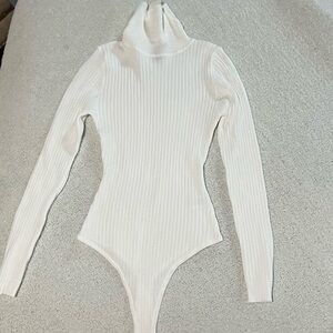 White Turtle Neck Bodysuit.